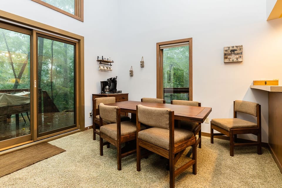 Dining area with counter stools seats 8