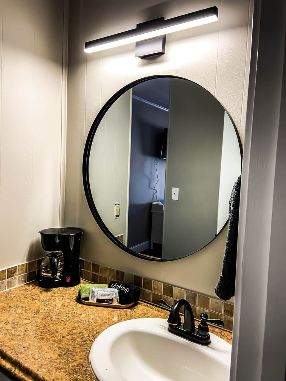 Bathroom mirror and coffee maker