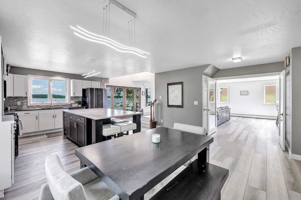 View from corner of dining room facing kitchen and into living room