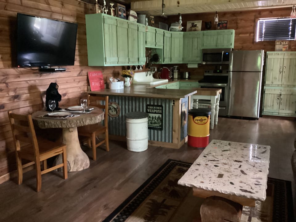 Repurposed kitchen with pallet cabinets.