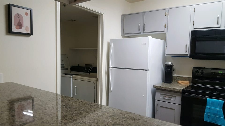Laundry room with door off the kitchen.