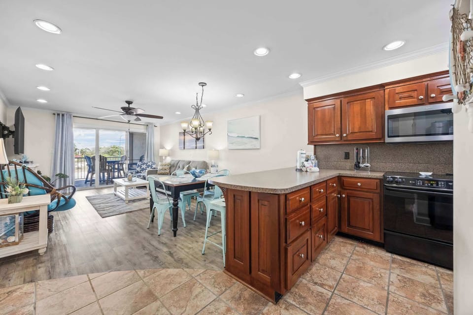 Kitchen overlooks dining and living room
