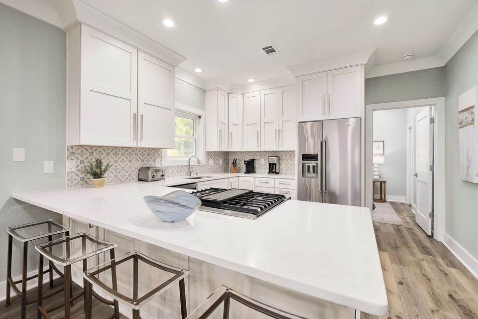 Expansive kitchen island with additional seating.