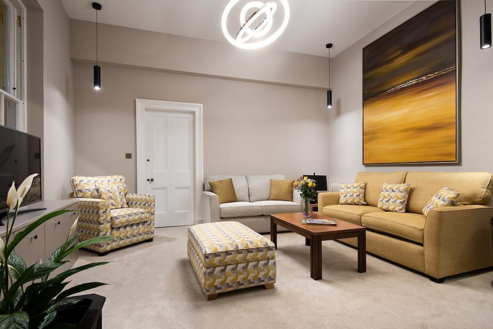 The Scott Apartment - a spacious open-plan living space with additional sofa bed