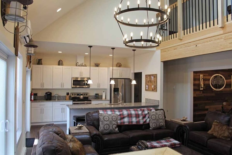 The brand new kitchen opens up to the family room, perfect for gatherings.