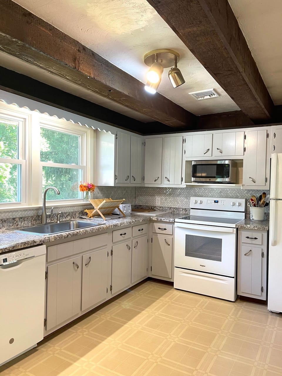 Beautiful sunny new kitchen is well appointed