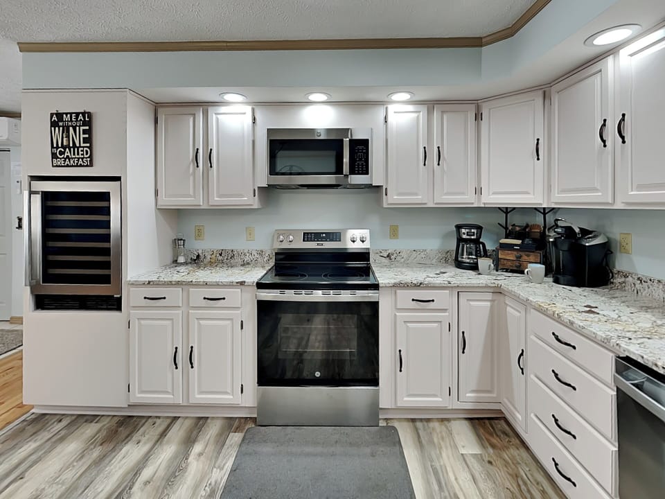 Full Kitchen w/ Wine Fridge & Coffee Station
