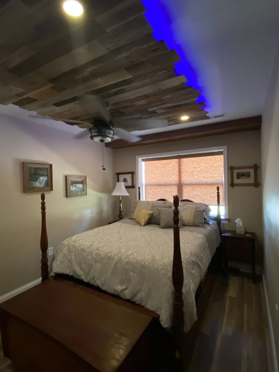 Bedroom with queen size bed and 3” foam topper for luxury comfort. 