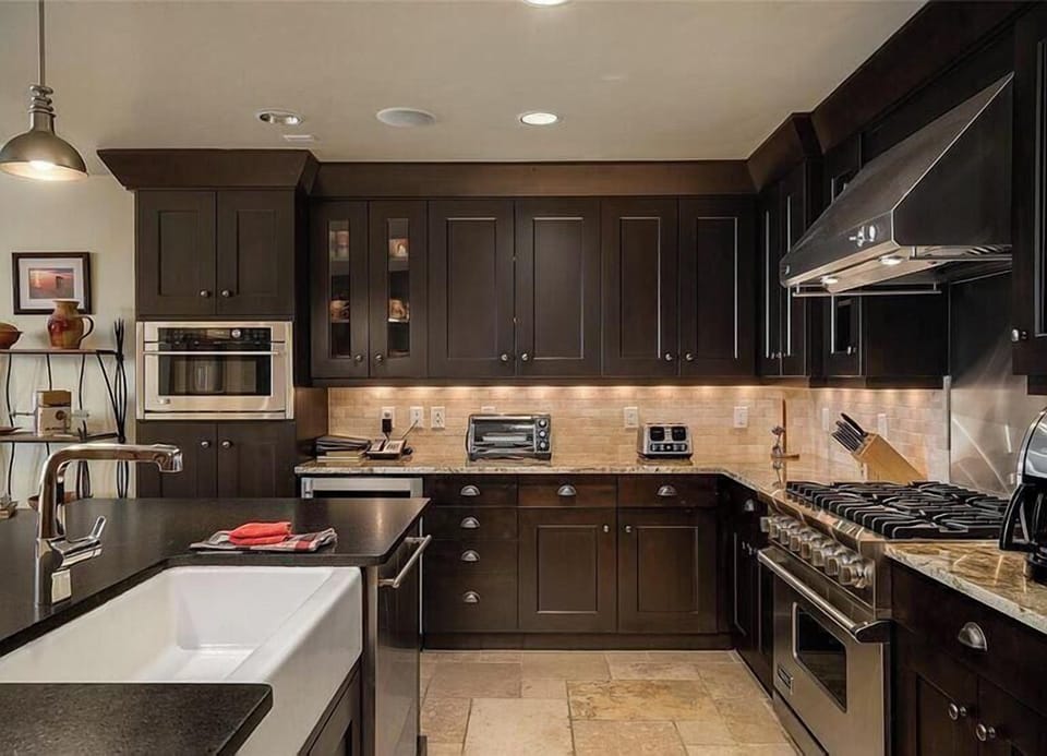 Six burner Viking stove, high end stainless appliances.