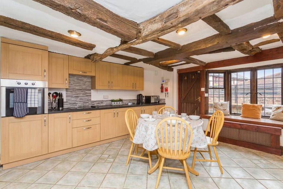 Fully equipped kitchen with low beams