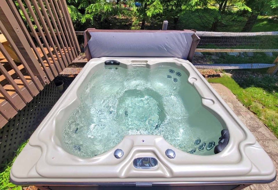 The patio features a brand new 5-person jetted hot tub.