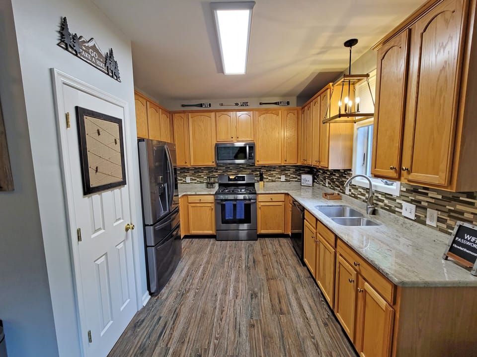 Offers custom 42" cabinets, granite countertops and a luxury appliance suite.