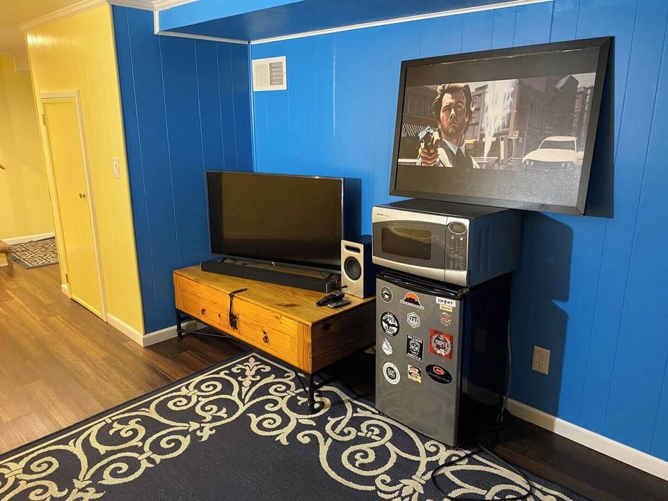 Downstair Mini fridge. Microwave. TV with soundbar 