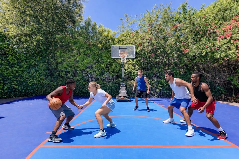 Enjoy our newly added fresh blue half basketball court with friends