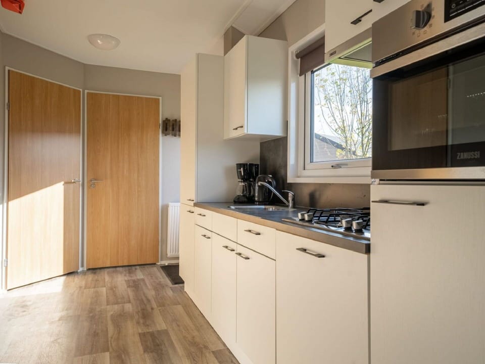 Cabinetry, Kitchen Sink, Sink, Countertop, Kitchen, Wood, Tap, Kitchen Stove, Interior Design, Kitchen Appliance