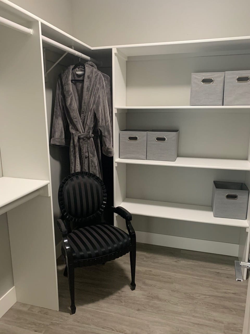 Master bedroom closet with robes for guest use. 