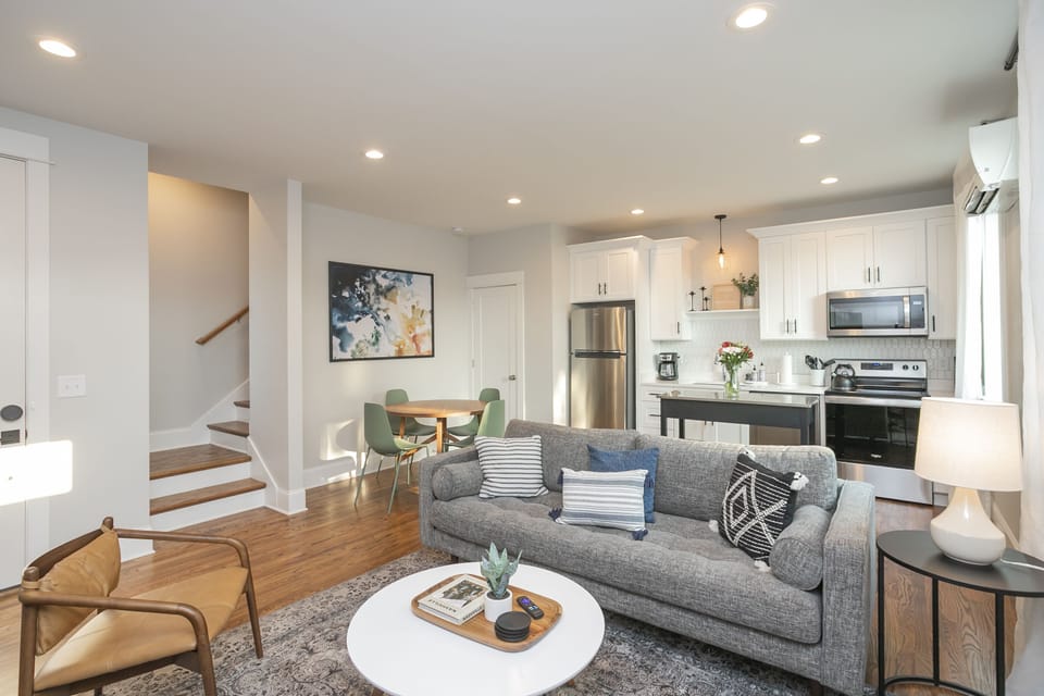 First floor living room, dining room, and fully stocked kitchen! 