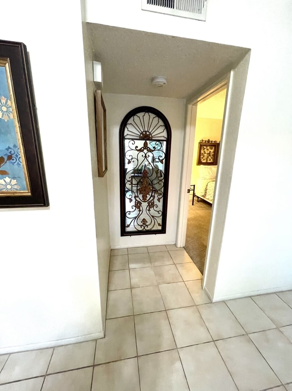 corridor to master bed + bath
