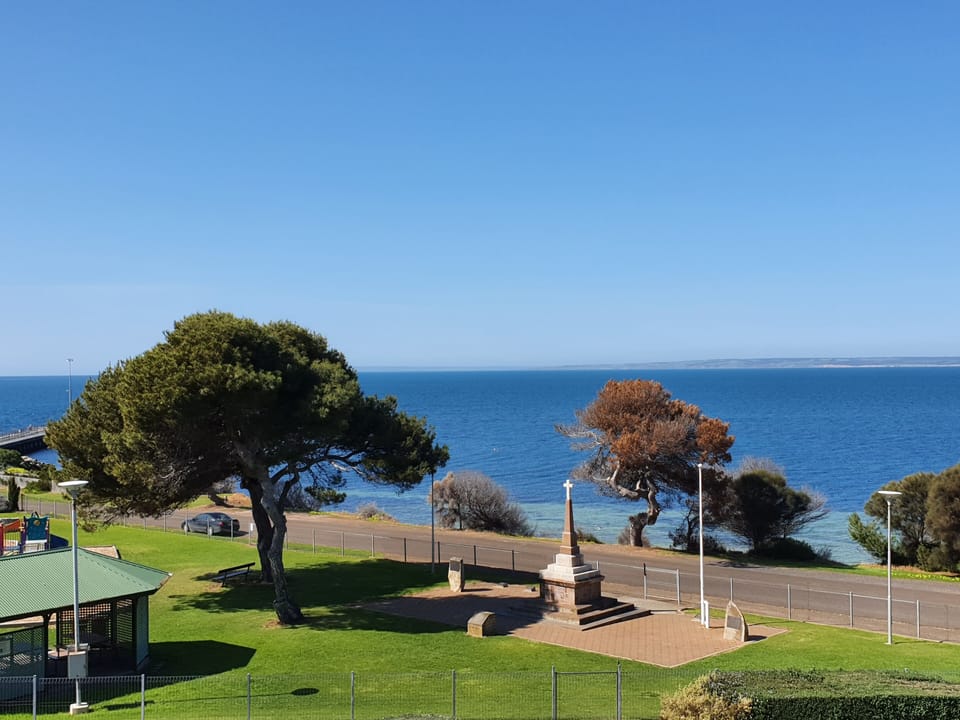 Views to the ocean, jetty, playground and park