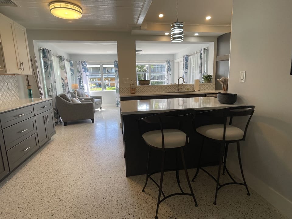 Spacious floor plan including living room, kitchen, and dining room