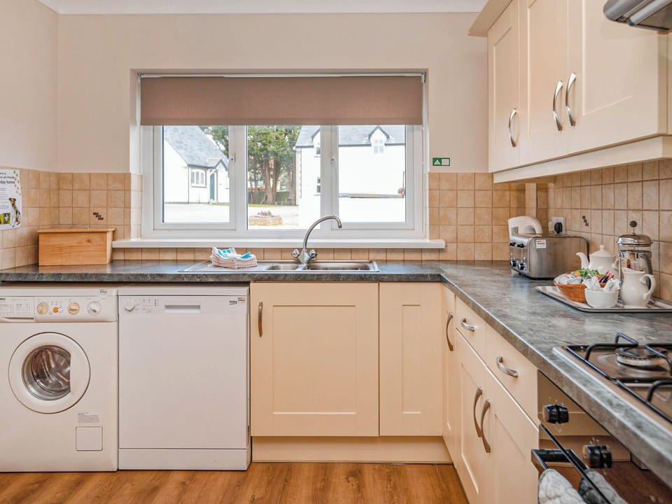 Kitchen | Puffin Cottage - Celtic Haven Resort, Lydstep, near Tenby