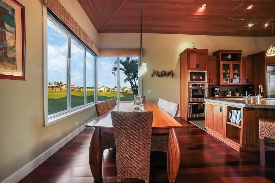 Dining room table overlooking the Kiahuna Golf Course