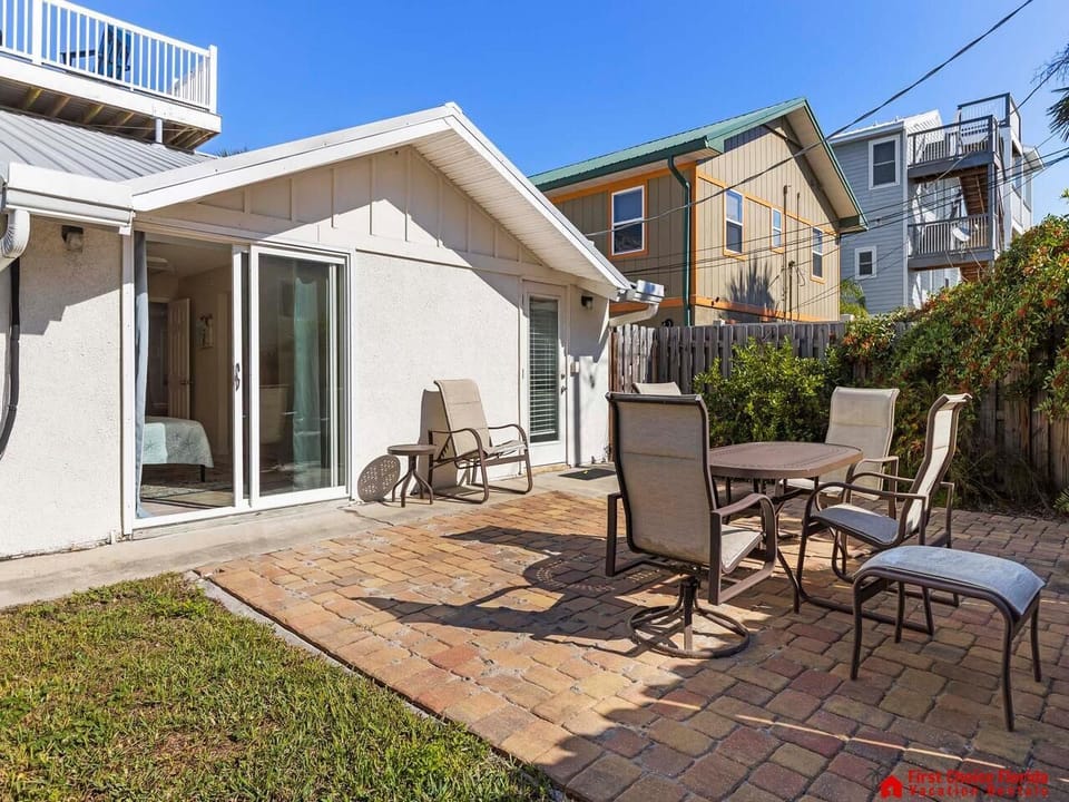 Sunny patio with cozy seating for outdoor gatherings