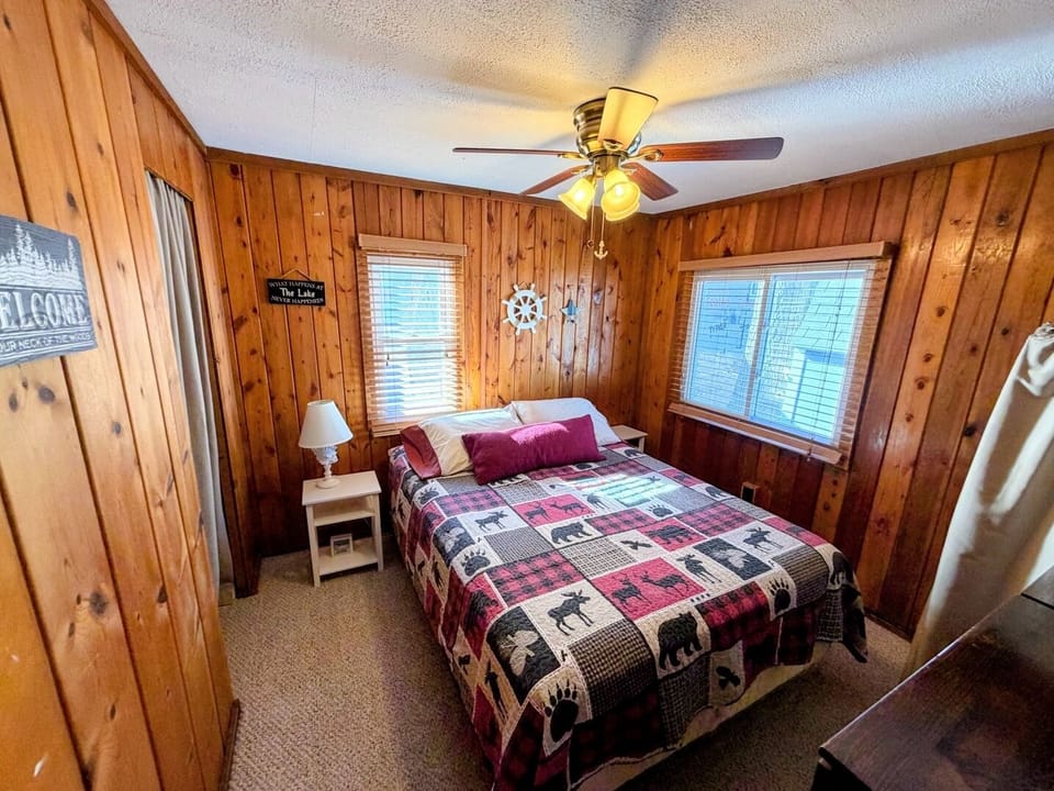 Queen bed with Roku TV.