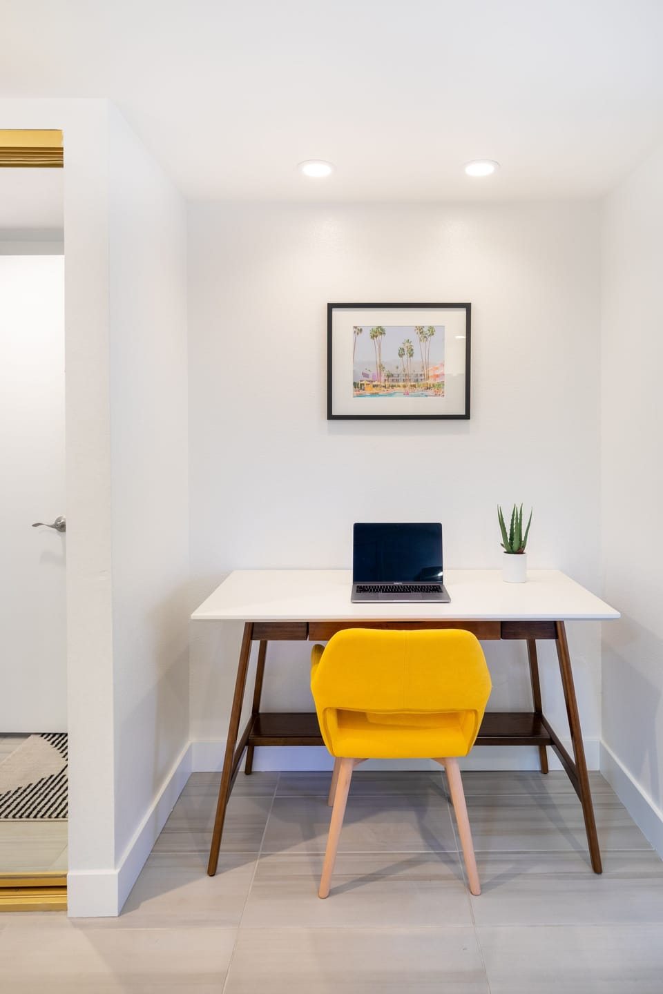 A dedicated workspace in the primary bedroom for remote working.
