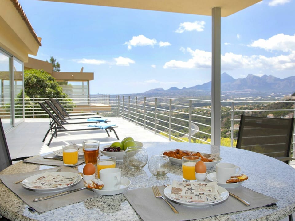Cloud, Table, Sky, Tableware, Furniture, Property, Food, Building, Dishware, Chair