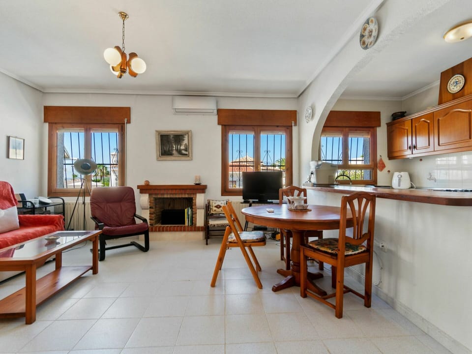 Table, Couch, Furniture, Property, Picture Frame, Building, Chair, Azure, Interior Design, Wood