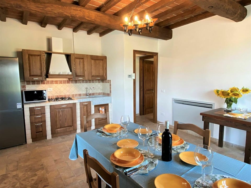 Table, Furniture, Property, Cabinetry, Blue, Tableware, Chair, Lighting, Interior Design, Wood