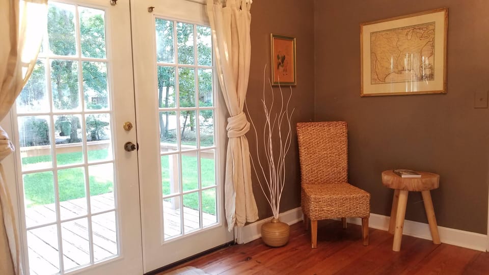 Mud room with back patio