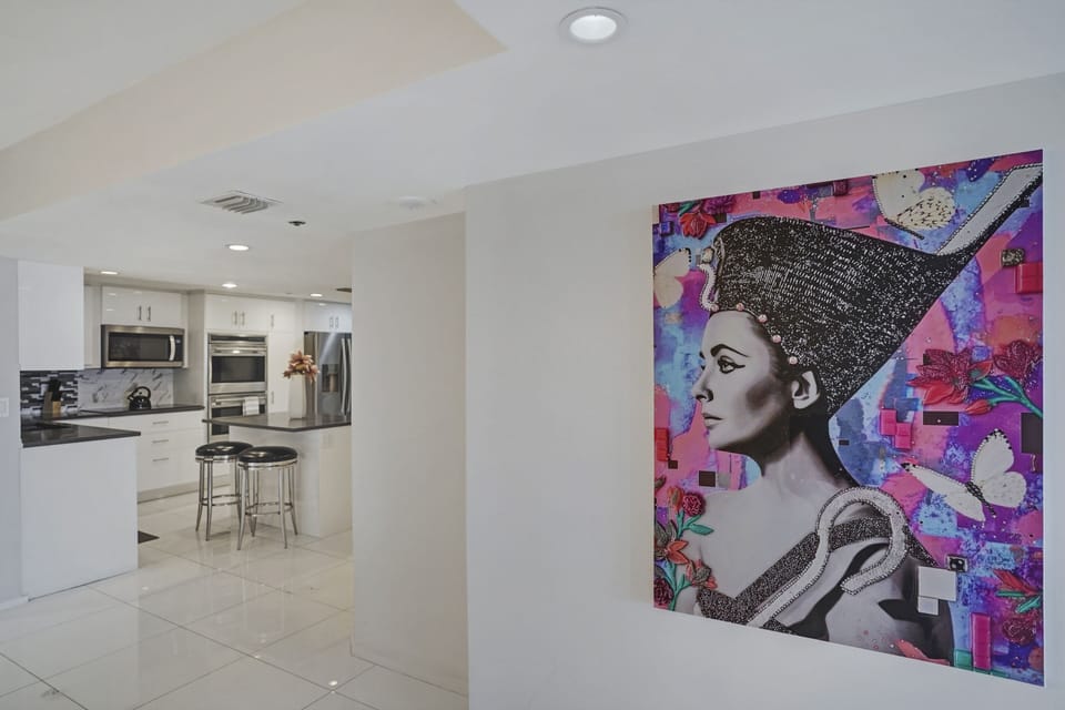 Views into fully equipped kitchen 