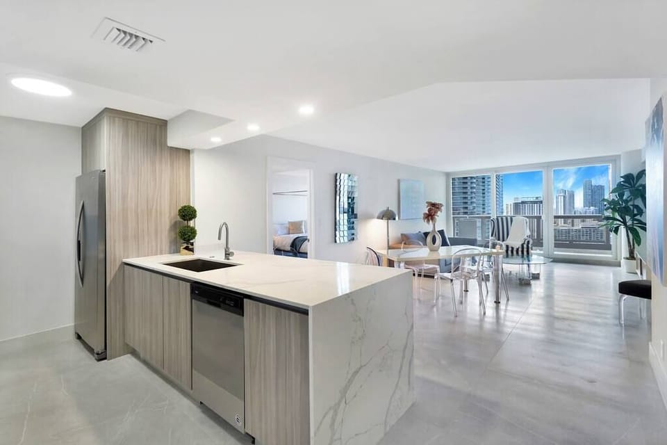 Dining, living room, fully equipped kitchen, balcony access