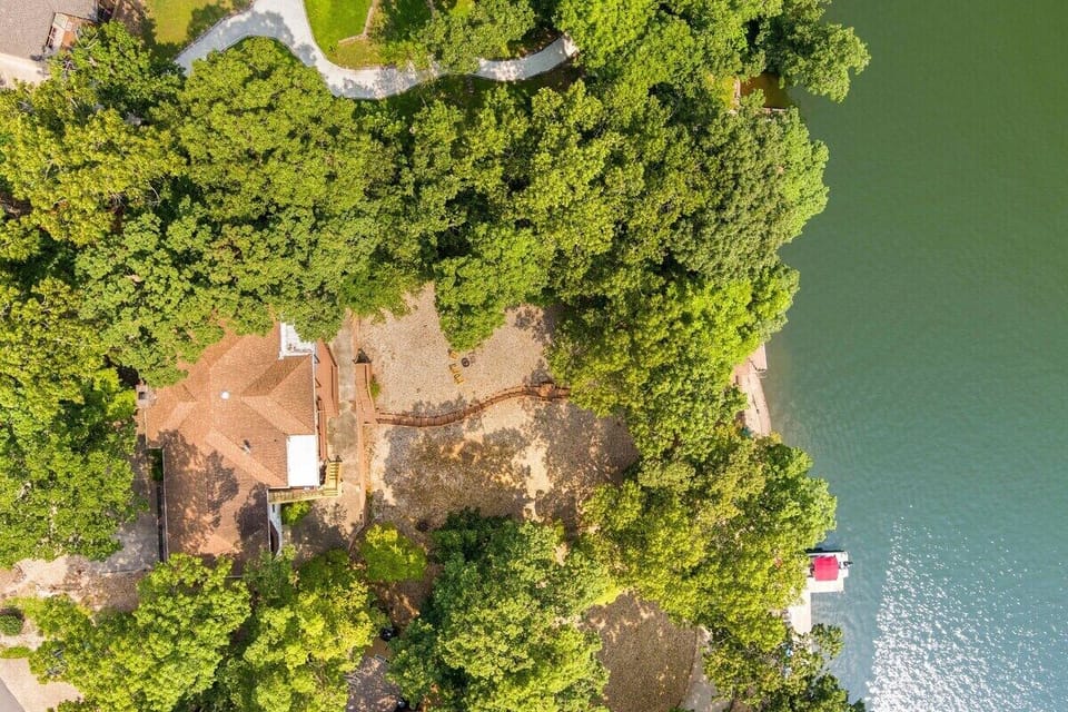A drone view of our property to show its majorly close proximity to our DOCK & Lake Loch Lomond.