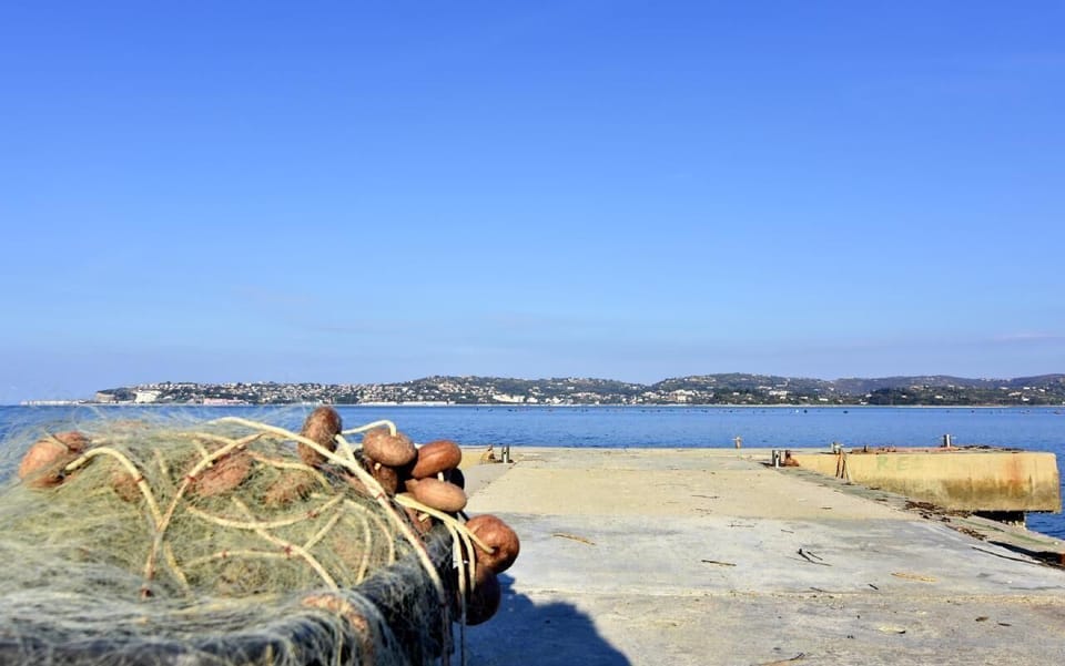 The village fishermen's nets on the concrete pier of Kanegra.