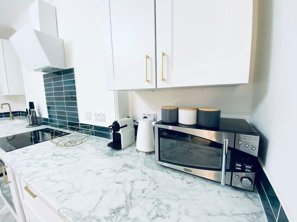 We have na lovely open plan kitchen, lounge, dining room 