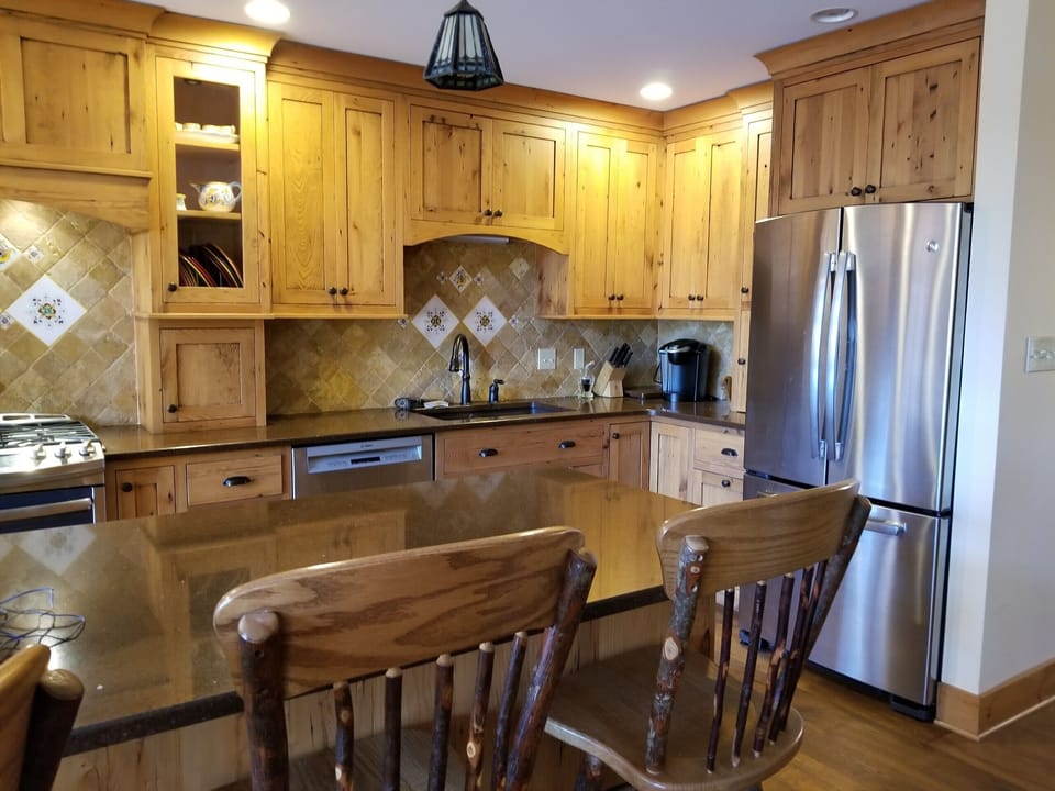 Beautiful modern kitchen with reclaimed hickory cabinets