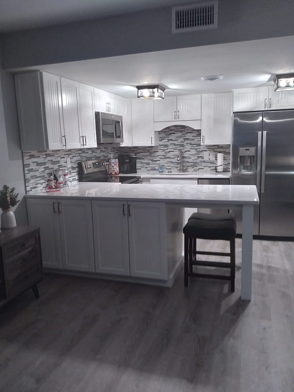 All new kitchen with beautiful backsplash 
