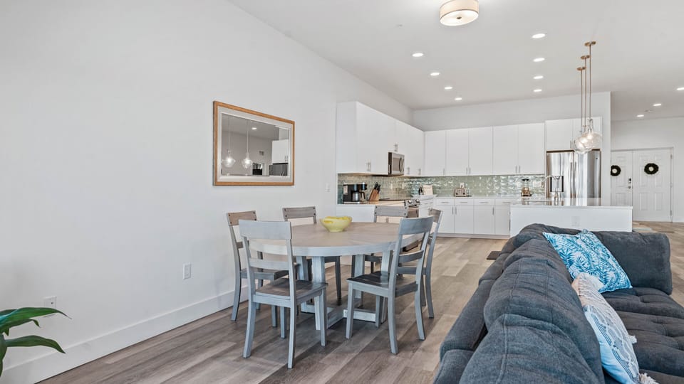 Large dining table and seating for six. Four more can eat at the island 