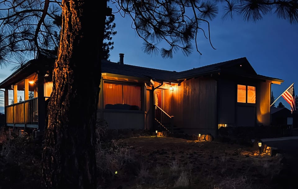 Front of cabin at dusk