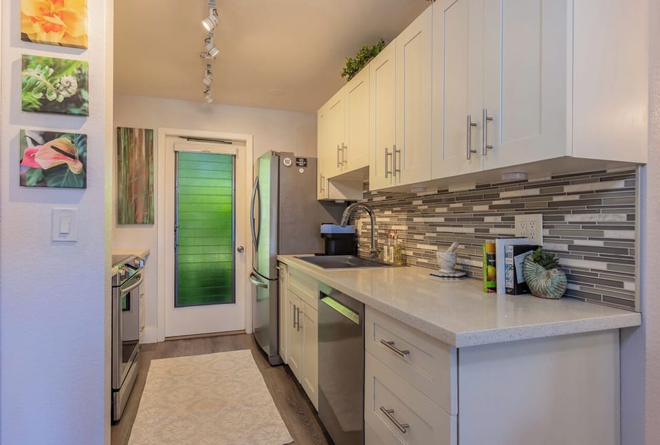 This kitchen is equipped with basic kitchen appliances