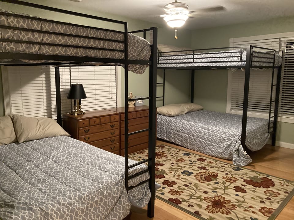 Two double over double beds in spacious bedroom