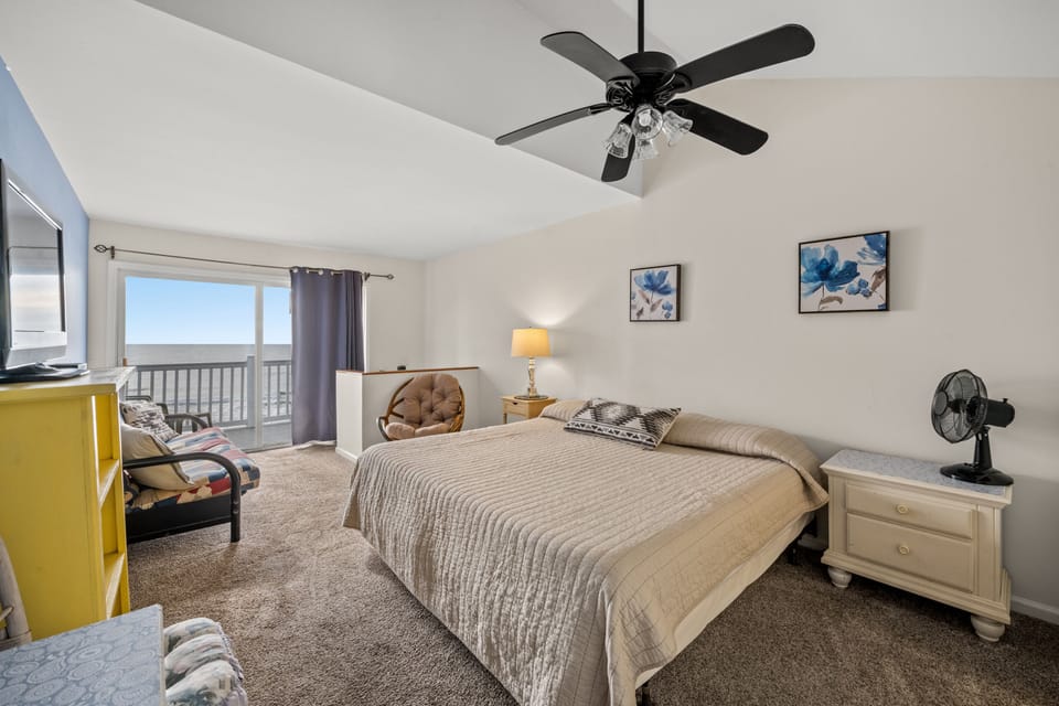 Spacious bedroom provides room for you and the kids. Check out the balcony!