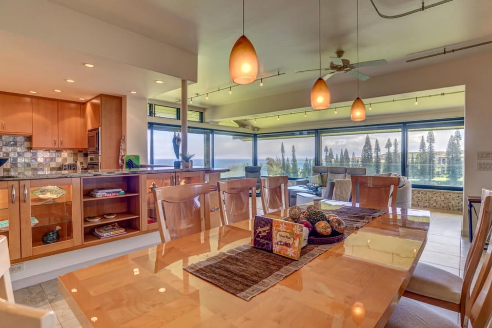 Enjoy breezy island vibes and polished wood tones while you dine, laugh, and relax in this stylish gathering spot    