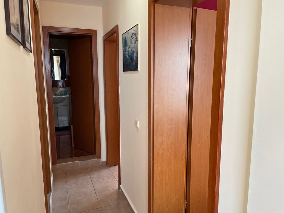 Walkway doors to both bedrooms and bathrooms