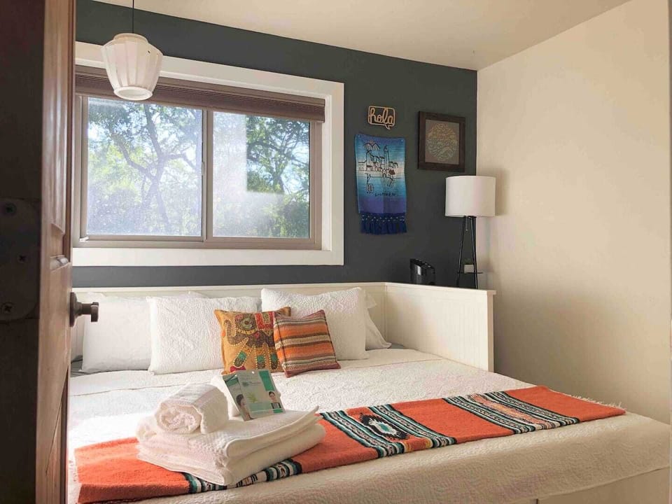 Guess bedroom with bed extended to its queen configuration. 
