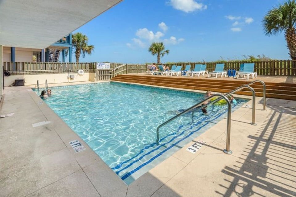 Take a cool dip in the pool after a fun day at the beach.