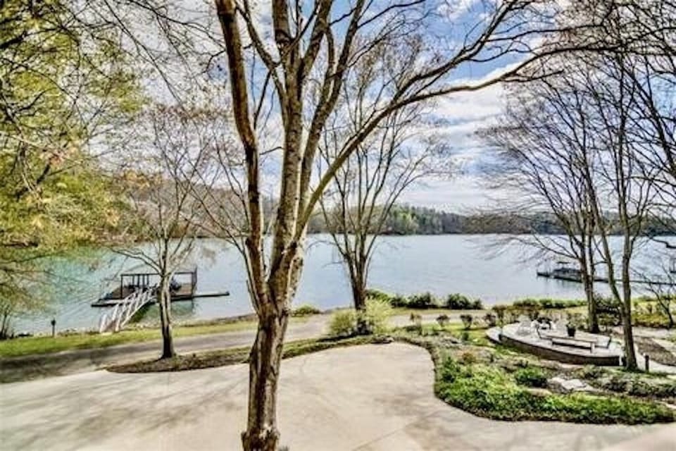 Lower private driveway and property view. 